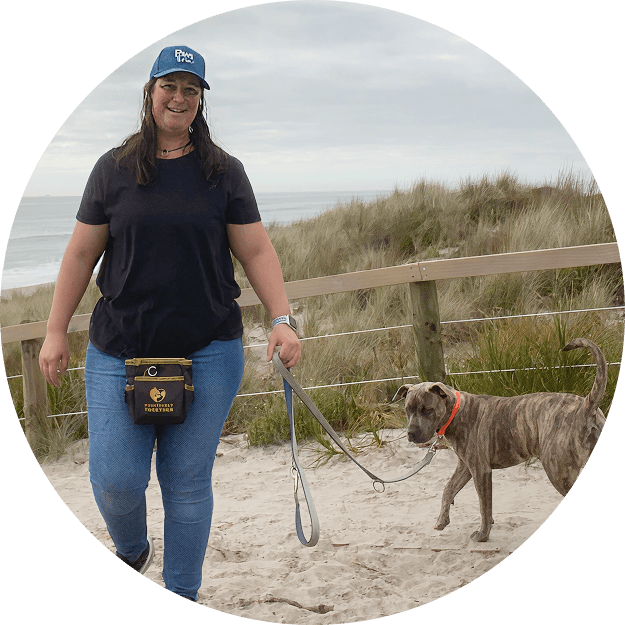 Brooke having a peaceful dog walk on Mount Maunganui Beach in Tauranga